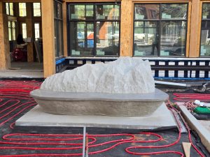 Kindred's public art collection features a sculptural bench created by One Hat One Hand