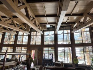 Kindred Resort's construction of the Mountain Vista Ballroom, a slopeside meeting and event space that features dramatic views and welcoming service. The new floor-to-ceiling windows were recently installed. 