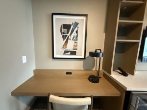 Hotel room. Desk with Artwork. Feb. 2026