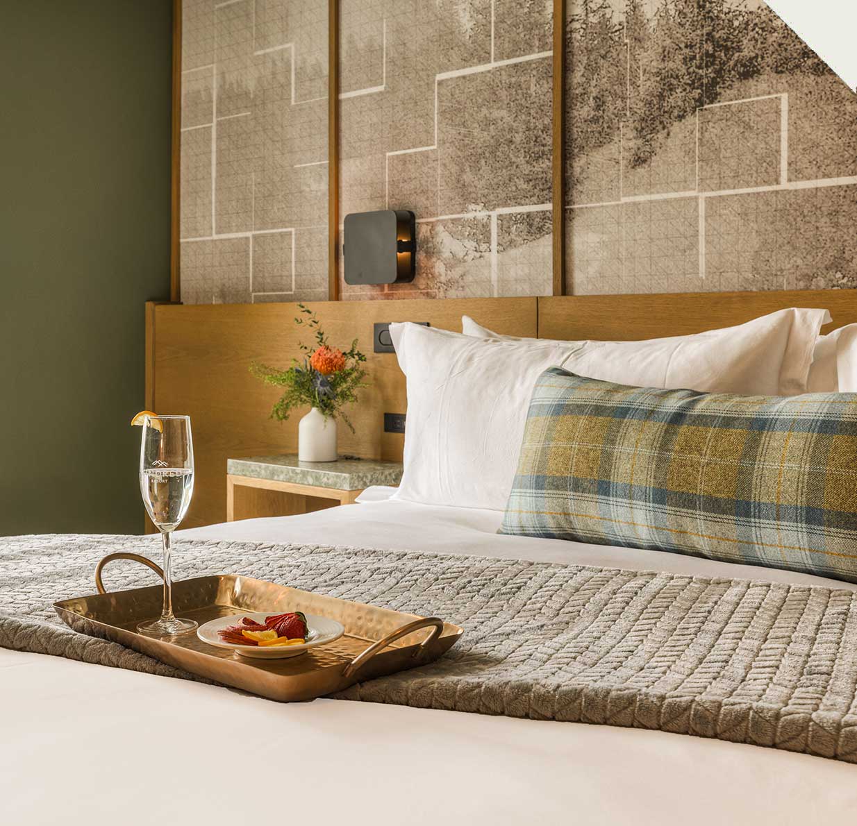 hotel room bed with breakfast